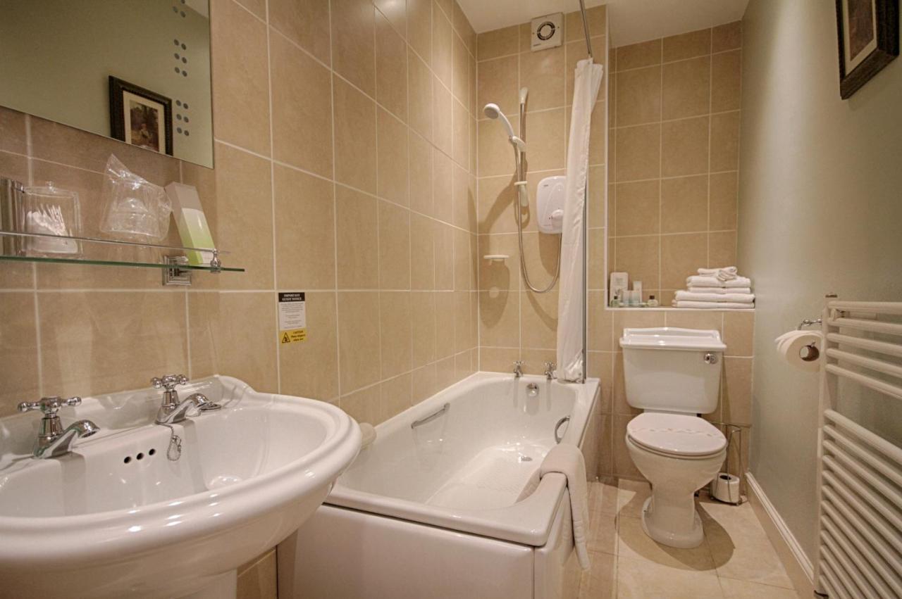 Holcombe House Guest House Llandudno Bagian luar foto