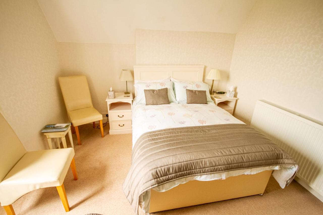 Holcombe House Guest House Llandudno Bagian luar foto