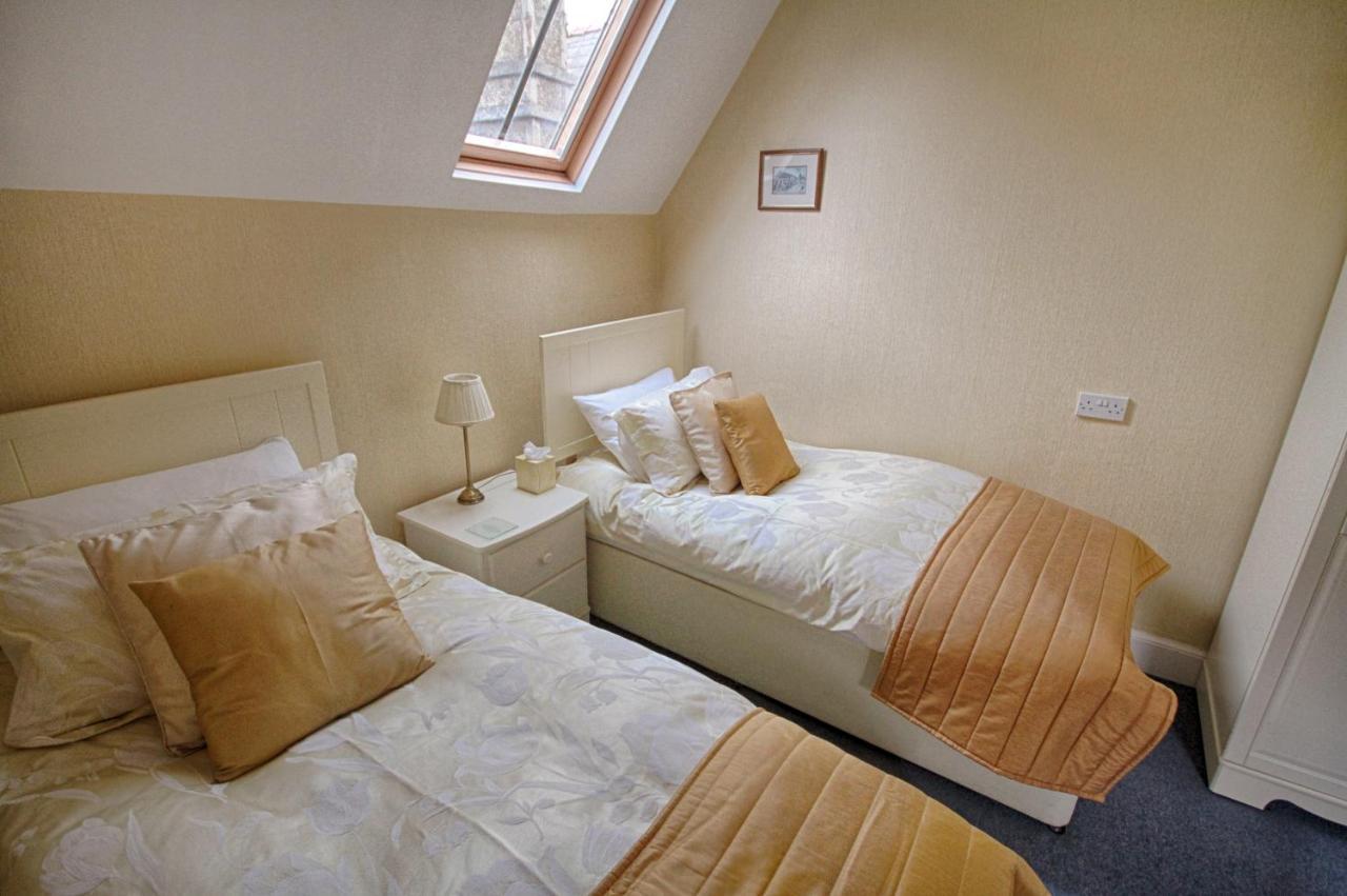 Holcombe House Guest House Llandudno Bagian luar foto